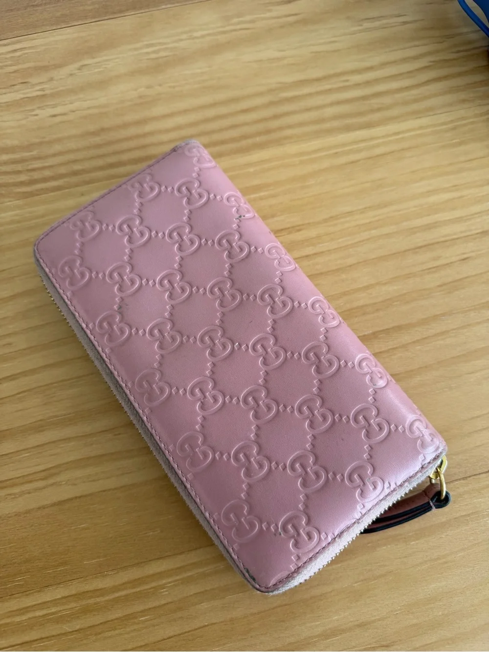 Gucci Pink Embossed GG Zip-Around Leather Wallet